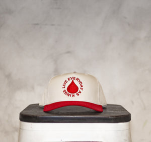 RED TRADEMARK SNAPBACK